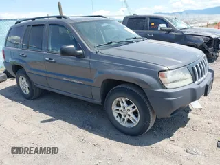 2004 Jeep Grand Cherokee Laredo z VIN 1J4GW48S14C324440, wystawiony jako IAAI lot #42405126 z przebiegiem 179 586 mil mil oraz . Historia ofert i sprzedaży dostępna na DreamBid. Obrazek 1.