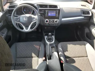 2015 Honda Fit LX with VIN 3HGGK5G55FM747740, listed as a Copart auction lot 61692725 with 61,923 mi miles and Salvage title. Bid and sale history available at DreamBid. Image 8.