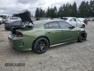 2019 Dodge Charger Scat Pack z VIN 2C3CDXGJ9KH593210, wystawiony jako Copart lot #56586775 z przebiegiem 73 405 mil mil oraz Szkoda całkowita • Salvage title. Historia ofert i sprzedaży dostępna na DreamBid. Obrazek 3.