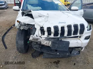 2016 Jeep Cherokee Latitude with VIN 1C4PJMCS5GW148829, listed as a IAAI auction lot 41964335 with 99,741 mi miles. Bid and sale history available at carsss.com. Image 6.