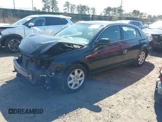 2005 Toyota Avalon XL with VIN 4T1BK36B95U048332, listed as a IAAI auction lot 41977547 with 61,293 mi miles and . Bid and sale history available at carsss.com. Image 2.