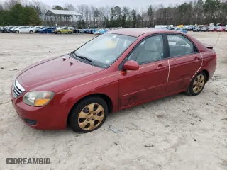 2009 Kia Spectra EX with VIN KNAFE221X95599435, listed as a Copart auction lot 44058325 with 112,089 mi miles and Salvage Title. Bid and sale history available at carsss.com. Image 1.