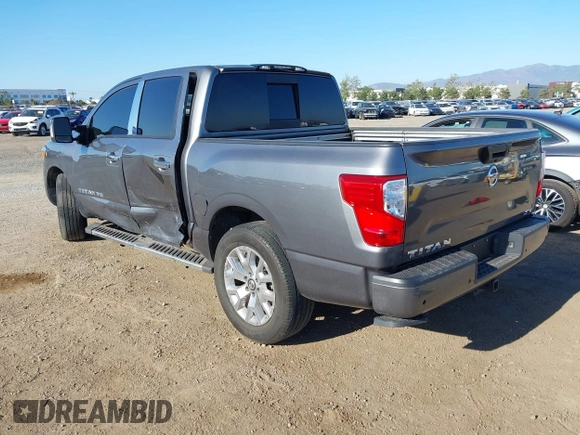 2020 Nissan Titan Platinum Reserve with VIN 1N6AA1EF8LN512582, listed as a IAAI auction lot 42236611 with 18,375 mi miles and . Bid and sale history available at DreamBid. Image 3.