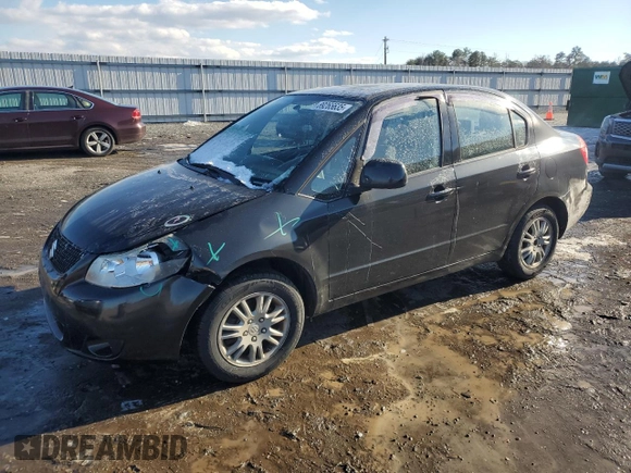 2012 Suzuki SX4 LE with VIN JS2YC5A3XC6303083, listed as a Copart auction lot 89265635 with 155,316 mi miles and Salvage Title. Bid and sale history available at carsss.com. Image 1.