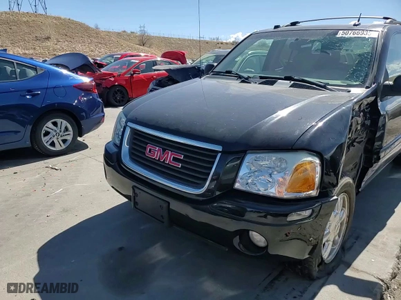 2005 GMC Envoy SLE with VIN 1GKDT13S752390266, listed as a Copart auction lot 50766935 with 115,225 mi miles and Salvage Title. Bid and sale history available at carsss.com. Image 12.