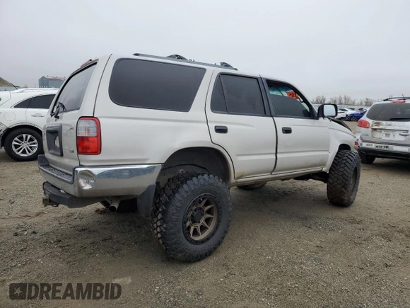 1999 Toyota 4Runner z VIN JT3HM84R3X0034771, wystawiony jako Copart lot #84952924 z przebiegiem 261 449 mil mil oraz Szkoda całkowita • Salvage title. Historia ofert i sprzedaży dostępna na DreamBid. Obrazek 3.