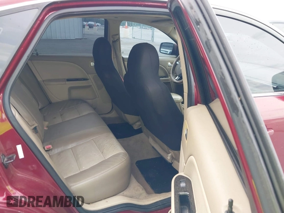 2007 Mercury Montego Premier with VIN 1MEHM42177G614595, listed as a IAAI auction lot 42097908 with 171,191 mi miles and . Bid and sale history available at DreamBid. Image 8.