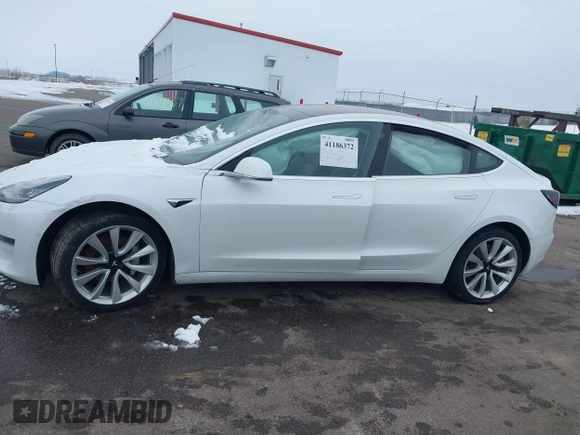 2018 Tesla Model 3 Long Range Battery with VIN 5YJ3E1EB2JF089006, listed as a IAAI auction lot 41186372 with Not Provided miles and . Bid and sale history available at DreamBid. Image 13.