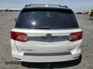 2018 Honda Odyssey Touring with VIN 5FNRL6H8XJB018438, listed as a Copart auction lot 61876505 with 104,581 mi miles and Salvage title. Bid and sale history available at DreamBid. Image 6.
