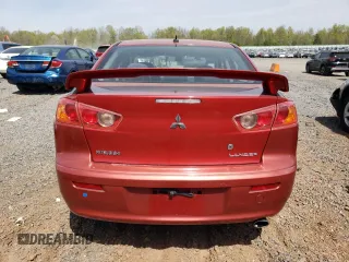 2009 Mitsubishi Lancer with VIN JA3AU86W09U034186, listed as a Copart auction lot 54118385 with 113,346 mi miles and Salvage Title. Bid and sale history available at DreamBid. Image 6.