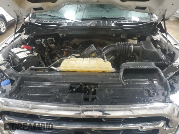 2021 Ford F-150 XL z VIN 1FTFW1E50MFA23431, wystawiony jako Copart lot #51638895 z przebiegiem 51 473 mil mil oraz Szkoda całkowita • Salvage title. Historia ofert i sprzedaży dostępna na DreamBid. Obrazek 11.