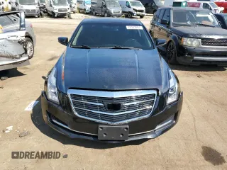 2016 Cadillac ATS Standard AWD z VIN 1G6AG1RX8G0101189, wystawiony jako Copart lot #72593864 z przebiegiem 111 981 mil mil oraz Szkoda całkowita • Salvage title. Historia ofert i sprzedaży dostępna na DreamBid. Obrazek 5.
