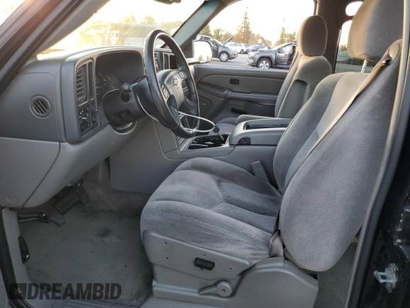 2005 Chevrolet Tahoe LS with VIN 1GNEC13T65R254833, listed as a Copart auction lot 77916164 with 164,550 mi miles and Salvage Title. Bid and sale history available at carsss.com. Image 7.