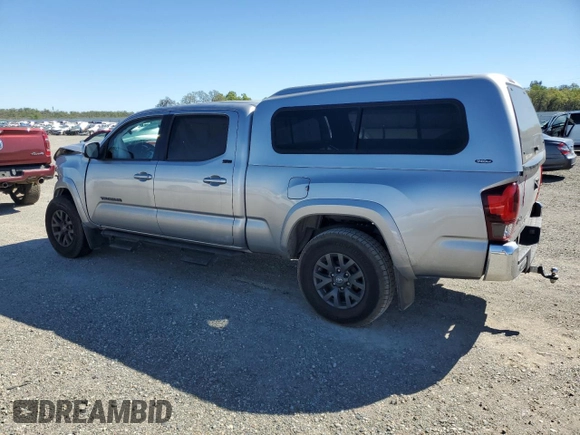 2021 Toyota Tacoma SR5 with VIN 3TMDZ5BN0MM103256, listed as a Copart auction lot 50101675 with 49,673 mi miles and Salvage title. Bid and sale history available at DreamBid. Image 2.