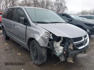 2014 Dodge Grand Caravan American Value with VIN 2C4RDGBG9ER187198, listed as a IAAI auction lot 41669334 with 204,803 mi miles and . Bid and sale history available at DreamBid. Image 1.