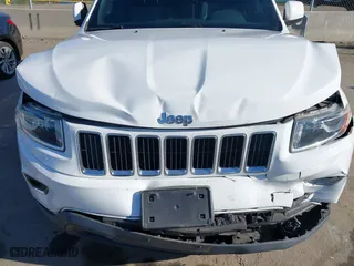 2014 Jeep Grand Cherokee Laredo with VIN 1C4RJEAGXEC130399, listed as a IAAI auction lot 41861664 with 106,925 mi miles. Bid and sale history available at carsss.com. Image 17.