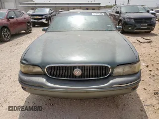 1999 Buick LeSabre Limited z VIN 1G4HR52K5XH469192, wystawiony jako Copart lot #57516205 z przebiegiem 102 413 mil mil oraz Czysty tytuł • Clean title. Historia ofert i sprzedaży dostępna na DreamBid. Obrazek 5.