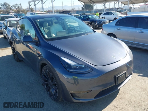 2022 Tesla Model Y Performance z VIN 7SAYGDEF2NF490794, wystawiony jako IAAI lot #42218742 z przebiegiem 41 402 mil mil oraz . Historia ofert i sprzedaży dostępna na DreamBid. Obrazek 1.