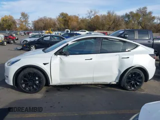 2021 Tesla Model Y Long Range with VIN 5YJYGDEE3MF098586, listed as a IAAI auction lot 40939802 with Not Provided miles and . Bid and sale history available at DreamBid. Image 13.
