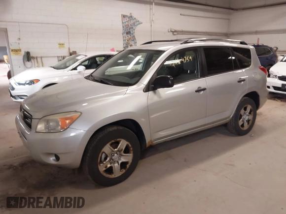 2007 Toyota RAV4 with VIN JTMBK33V776014769, listed as a IAAI auction lot 42024759 with 216,657 mi miles. Bid and sale history available at carsss.com. Image 2.
