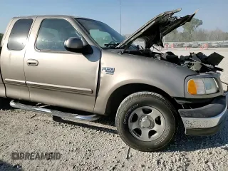 2002 Ford F-150 XL with VIN 1FTRX17L22NA48307, listed as a Copart auction lot 74238074 with 80,010 mi miles and Salvage title. Bid and sale history available at DreamBid. Image 11.