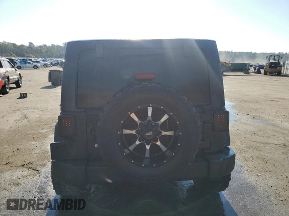 2018 Jeep Wrangler JK Unlimited Sport S with VIN 1C4HJWDG5JL928106, listed as a Copart auction lot 77670184 with 70,228 mi miles and Salvage Title. Bid and sale history available at carsss.com. Image 6.