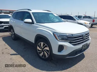 2024 Volkswagen Atlas SE z VIN 1V2HR2CA0RC566016, wystawiony jako IAAI lot #42761263 z przebiegiem 29 656 mil mil oraz . Historia ofert i sprzedaży dostępna na DreamBid. Obrazek 1.