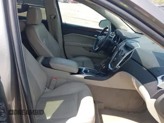 2011 Cadillac SRX Premium Collection with VIN 3GYFNFEY7BS519548, listed as a IAAI auction lot 42097305 with 124,083 mi miles and . Bid and sale history available at DreamBid. Image 5.