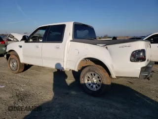 2003 Ford F-150 XLT with VIN 1FTRW08693KC51672, listed as a Copart auction lot 41368805 with 150,614 mi miles and Salvage Title. Bid and sale history available at carsss.com. Image 2.
