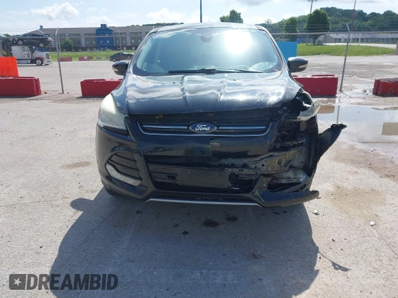 2013 Ford Escape SEL with VIN 1FMCU9HX1DUB97939, listed as a IAAI auction lot 42293561 with 196,951 mi miles and . Bid and sale history available at DreamBid. Image 13.