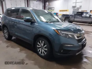 2020 Honda Pilot EX z VIN 5FNYF6H30LB001691, wystawiony jako IAAI lot #41532529 z przebiegiem 61 832 mil mil oraz . Historia ofert i sprzedaży dostępna na DreamBid. Obrazek 1.