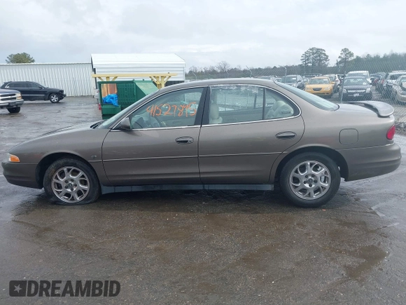 2000 Oldsmobile Intrigue GLS z VIN 1G3WX52H9YF131166, wystawiony jako IAAI lot #41527895 z przebiegiem 104 534 mil mil oraz . Historia ofert i sprzedaży dostępna na DreamBid. Obrazek 14.