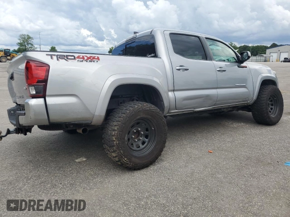 2019 Toyota Tacoma SR with VIN 3TMCZ5AN2KM193701, listed as a Copart auction lot 56776385 with 112,990 mi miles and Salvage title. Bid and sale history available at DreamBid. Image 3.