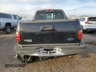 2004 Ford F-150 with VIN 2FTRF08W74CA53629, listed as a Copart auction lot 87326734 with 229,631 mi miles and Salvage title. Bid and sale history available at DreamBid. Image 6.