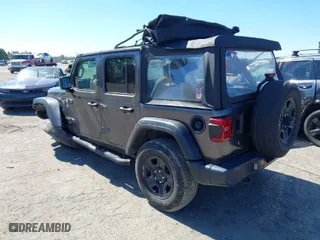 2018 Jeep Wrangler Unlimited Sport S with VIN 1C4HJXDG5JW147316, listed as a IAAI auction lot 41776654 with 92,227 mi miles. Bid and sale history available at carsss.com. Image 3.