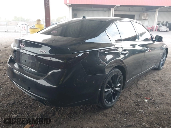 2019 Infiniti Q50 Luxe with VIN JN1EV7ARXKM593846, listed as a IAAI auction lot 42773548 with 57,165 mi miles and . Bid and sale history available at DreamBid. Image 4.