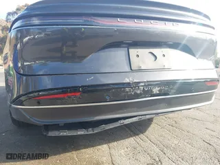2024 Lucid Air Pure with VIN 50EA1PGA4RA004886, listed as a IAAI auction lot 41349451 with 4,165 mi miles. Bid and sale history available at carsss.com. Image 6.