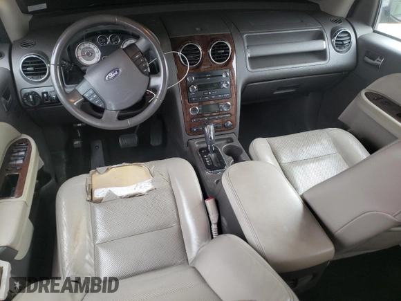 2009 Ford Taurus X Limited with VIN 1FMDK03W89GA01358, listed as a Copart auction lot 79132254 with 173,623 mi miles and Salvage title. Bid and sale history available at DreamBid. Image 8.