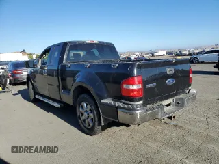 2005 Ford F-150 XLT with VIN 1FTPX02555KB99576, listed as a Copart auction lot 66905914 with 0 mi miles and Salvage Title. Bid and sale history available at carsss.com. Image 2.