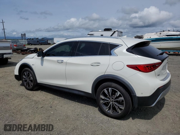 2019 Infiniti QX30 Luxe with VIN SJKCH5CR7KA011861, listed as a Copart auction lot 52147015 with 77,905 mi miles and Salvage title. Bid and sale history available at DreamBid. Image 2.