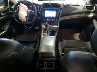 2016 Nissan Maxima SL with VIN 1N4AA6AP1GC448178, listed as a Copart auction lot 61583035 with 131,492 mi miles and Salvage title. Bid and sale history available at DreamBid. Image 8.