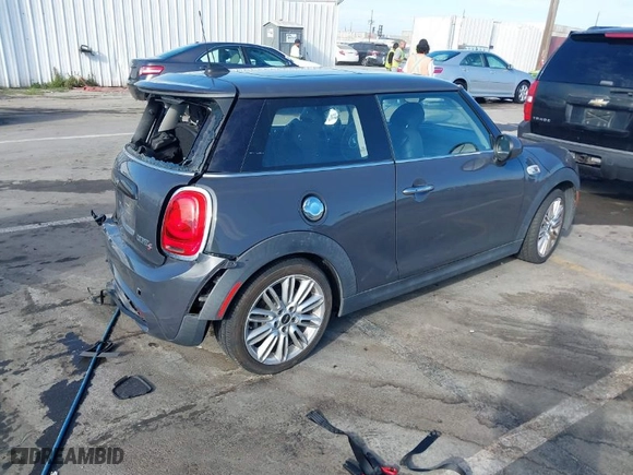 2015 MINI Cooper Hardtop S with VIN WMWXP7C59F2A60317, listed as a IAAI auction lot 41703020 with NaN miles. Bid and sale history available at carsss.com. Image 4.