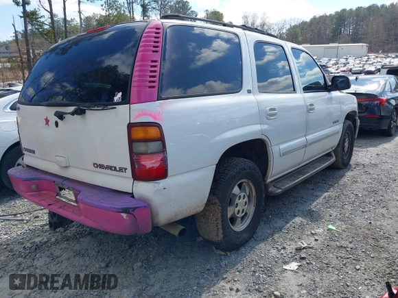 2001 Chevrolet Tahoe LS with VIN 1GNEC13T51J311841, listed as a IAAI auction lot 41633746 with Not provided miles and . Bid and sale history available at DreamBid. Image 4.