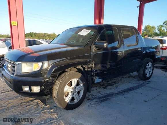 2012 Honda Ridgeline RTL with VIN 5FPYK1F51CB452400, listed as a IAAI auction lot 41853497 with 157,131 mi miles. Bid and sale history available at carsss.com. Image 6.