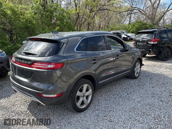 2018 Lincoln MKC Premiere with VIN 5LMCJ1C91JUL21722, listed as a Copart auction lot 52987075 with 87,441 mi miles and Clean Title. Bid and sale history available at DreamBid. Image 4.