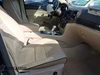 2019 Jeep Grand Cherokee Overland with VIN 1C4RJFCGXKC688543, listed as a IAAI auction lot 41643678 with 65,182 mi miles. Bid and sale history available at carsss.com. Image 5.