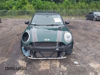 2016 MINI Convertible with VIN WMWWG5C51G3C19231, listed as a IAAI auction lot 42246342 with 93,876 mi miles and . Bid and sale history available at DreamBid. Image 12.
