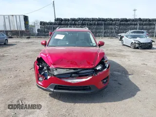 2016 Mazda CX-5 Grand Touring with VIN JM3KE4DY9G0850583, listed as a IAAI auction lot 42075545 with 92,789 mi miles and . Bid and sale history available at carsss.com. Image 12.