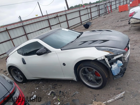 2016 Nissan 370Z Sport z VIN JN1AZ4EH1GM930883, wystawiony jako IAAI lot #41909945 z przebiegiem 80 484 mil mil oraz . Historia ofert i sprzedaży dostępna na DreamBid. Obrazek 14.
