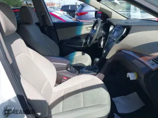2016 Hyundai Santa Fe Sport with VIN 5XYZU3LB0GG319512, listed as a IAAI auction lot 41932572 with 94,690 mi miles. Bid and sale history available at carsss.com. Image 5.